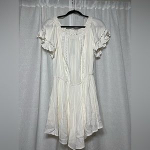 White romper. Pockets